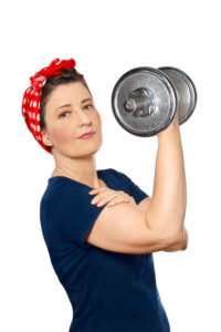Woman working out lifting weights bone health osteoporosis